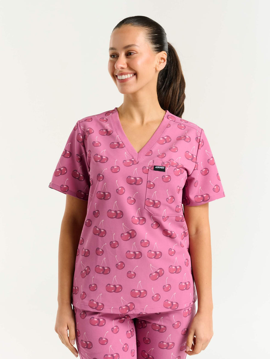 Essential One Pocket V Neck Scrub Top in Cherry Print | Airmed Scrubs